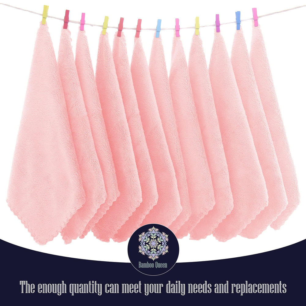 BAMBOO QUEEN pink washcloths stacked, adding warmth to bath time.