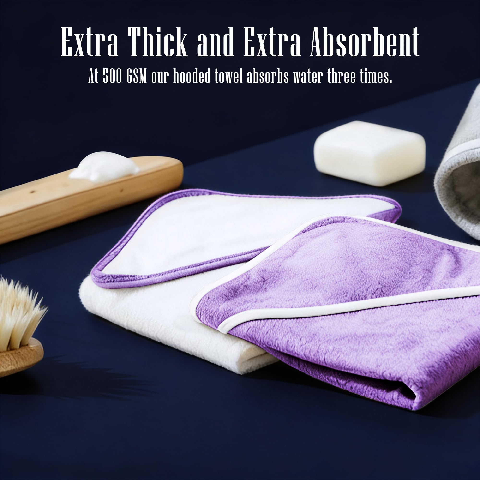 BAMBOO QUEEN soft plush towel draped on a baby after bath