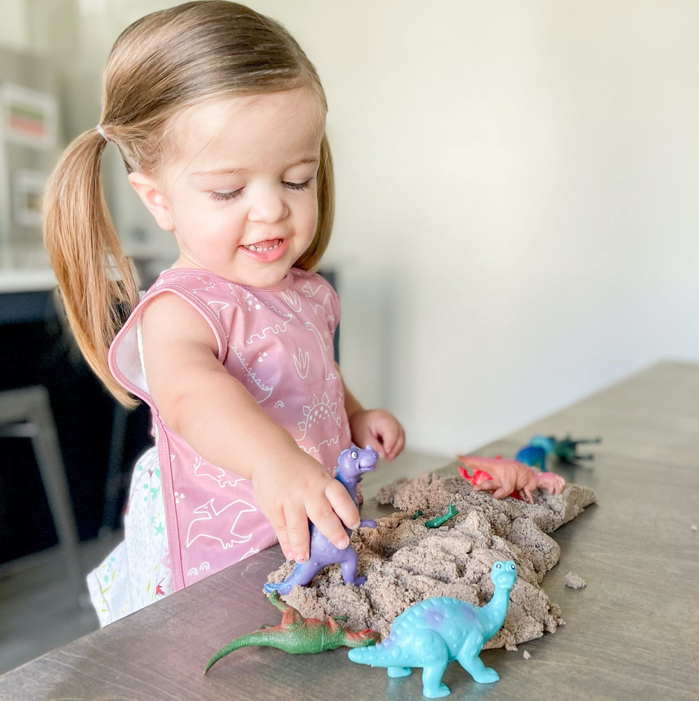 BapronBaby dino-friends-blush-machine-washable demonstrates simple care for busy families.