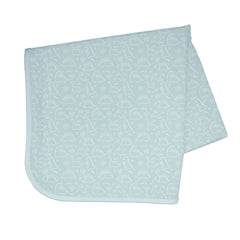 BapronBaby Dino Friends Sage Splash Mat under a high chair catching spills and splashes.
