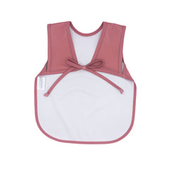 Close up of BapronBaby Minimalist Blush Bapron emphasizes waterproof fabric