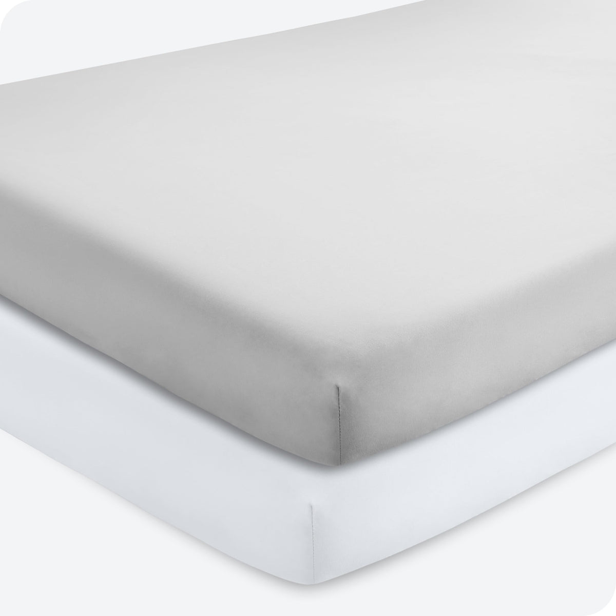 Bare Home 2-pack fitted crib sheets in Cloud Grey and White provide snug mattress fit.