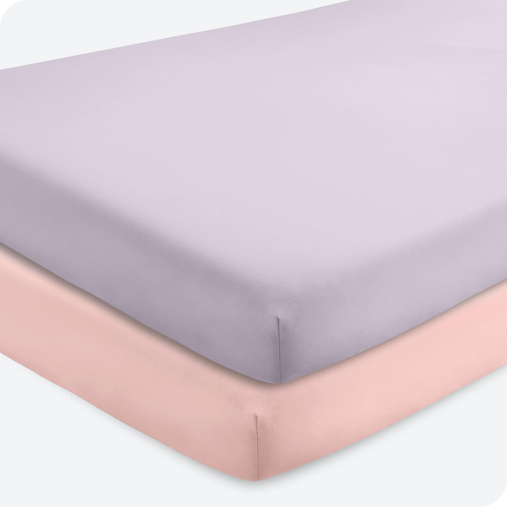 Bare Home 2-pack fitted crib sheets in pink slipper close-up showing ultra-soft microfiber texture