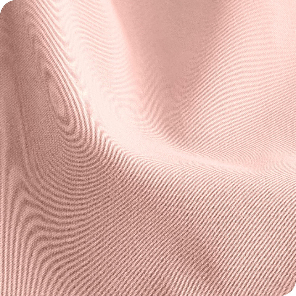 Bare Home Cloud Grey crib sheet blends with nursery decor and helps hide minor stains.