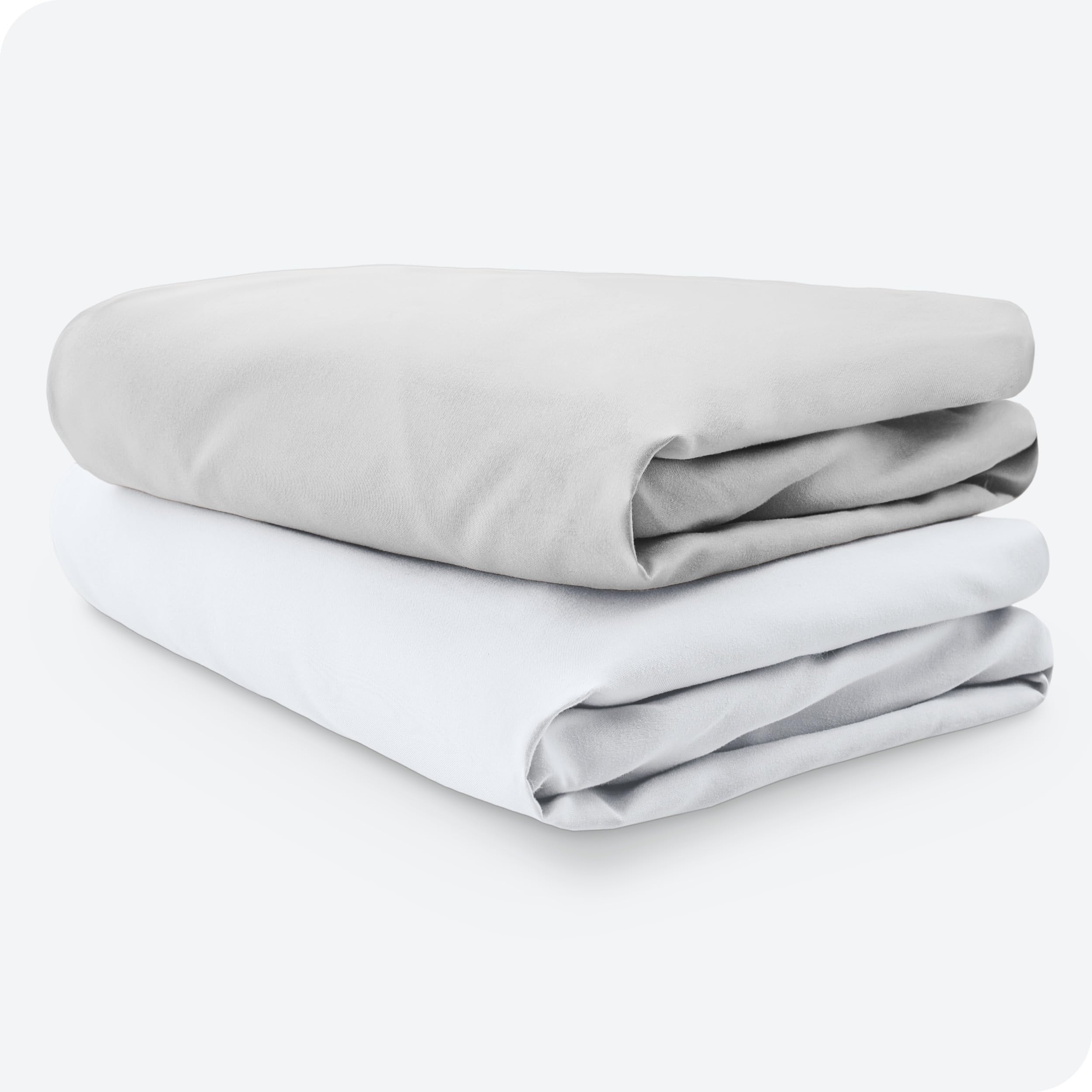 Bare Home crib sheets in use in a cozy baby nursery.