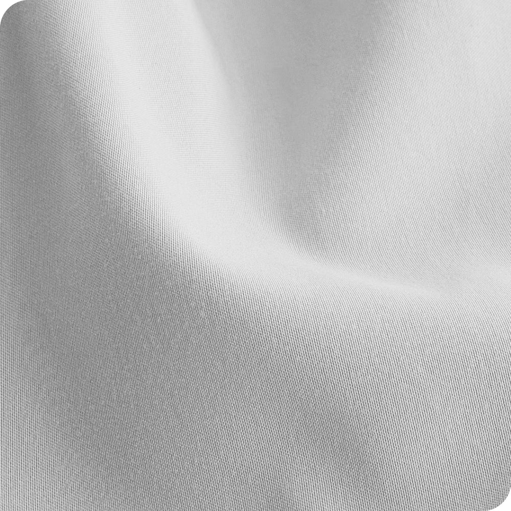 Bare Home crib sheets on a nursery mattress ready for nightly use.