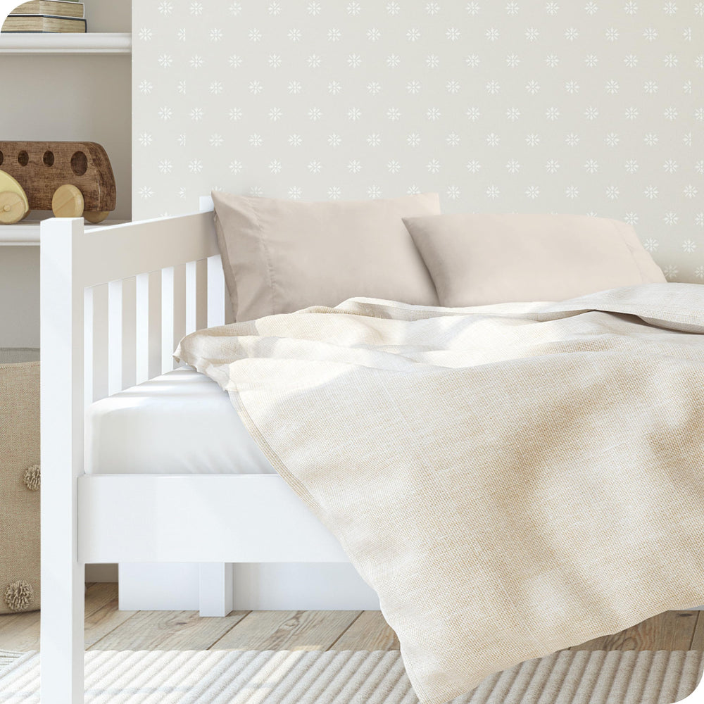 Bare Home toddler microfiber pillowcase closeup weave shows durable, long-lasting fibers in sand.