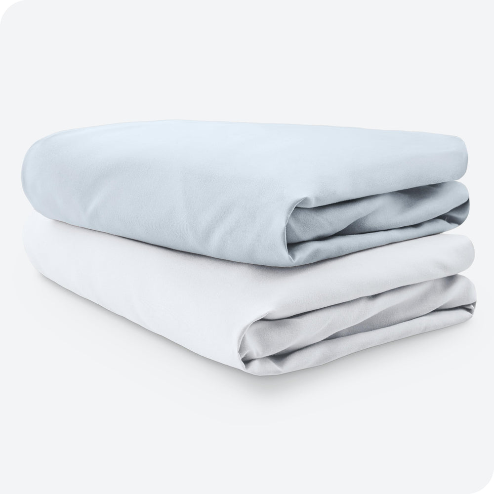 Bare Home sky blue and white nursery set enhances cozy sleep spaces.