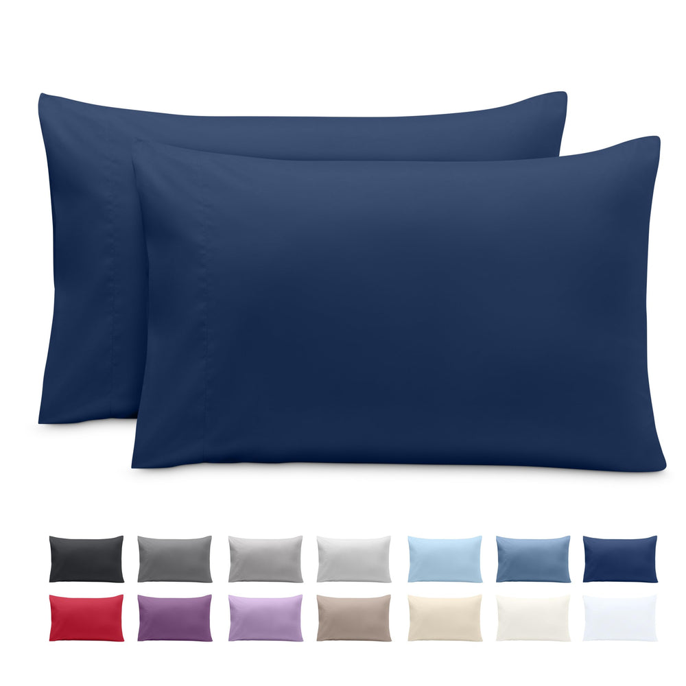 Bare Home toddler pillowcase on bed in dark blue for cozy sleep