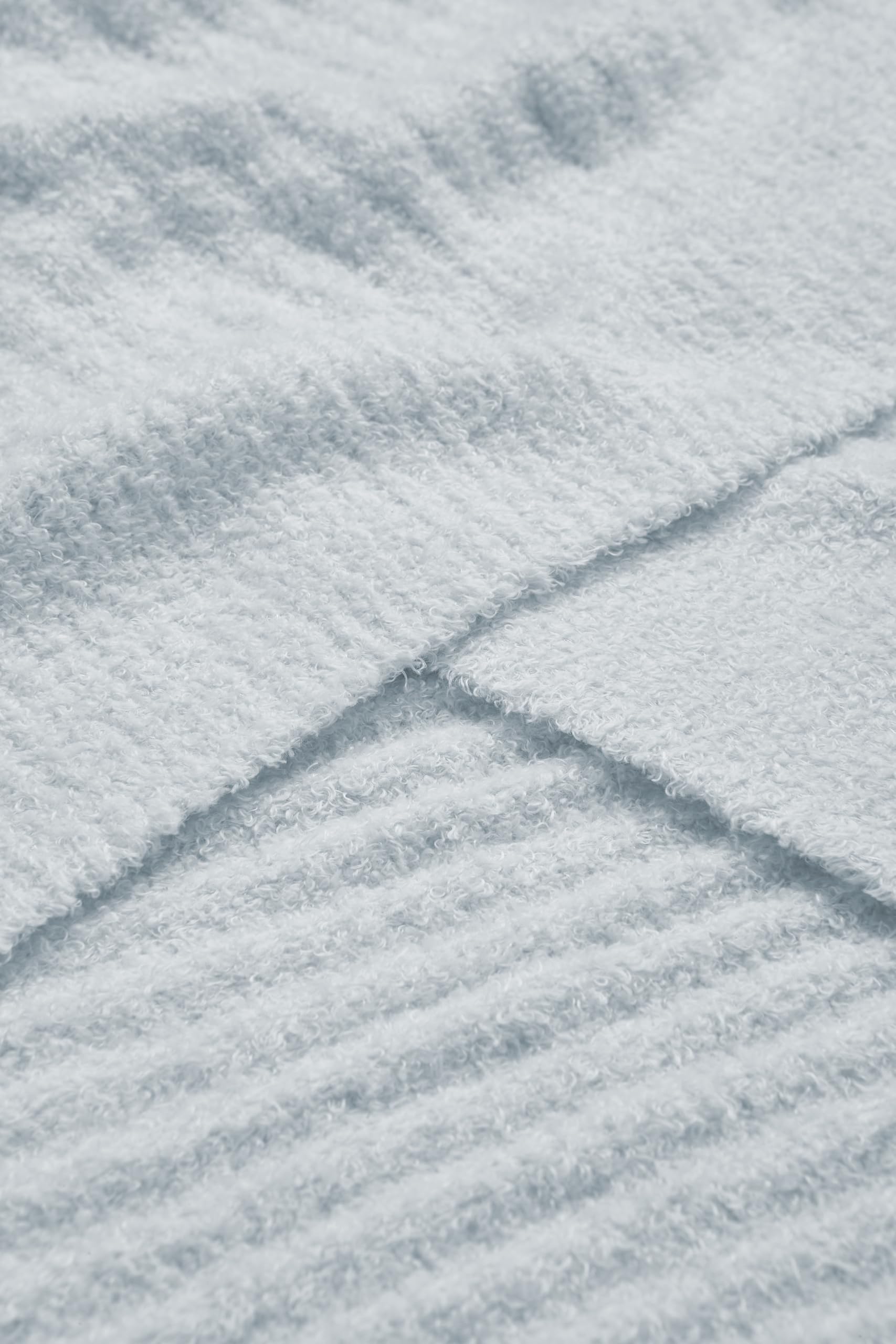 Barefoot Dreams CozyChic Lite blanket in blue for bedtime snuggle and reading