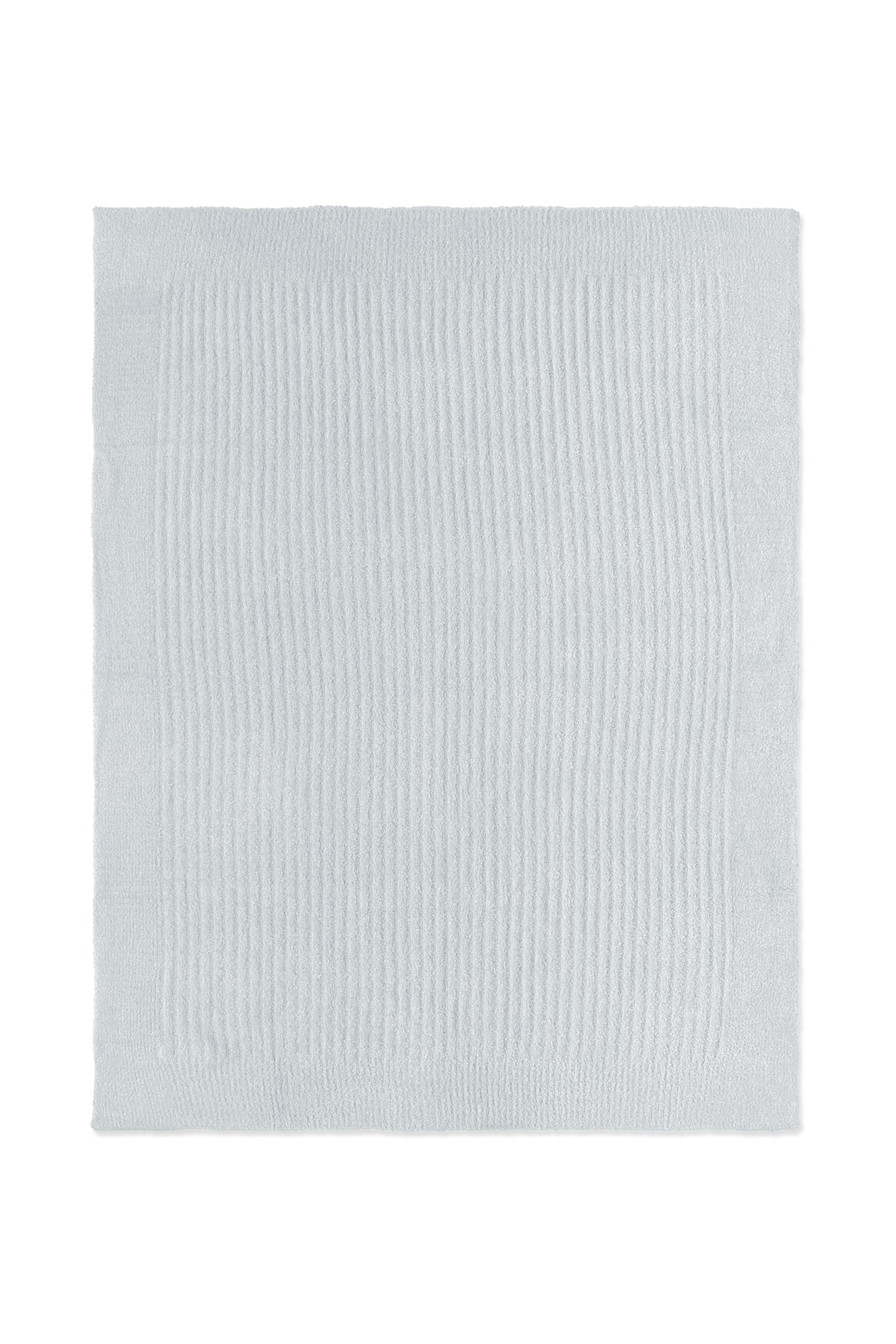 Barefoot Dreams CozyChic Lite blanket folded in nursery for soothing bedtimes