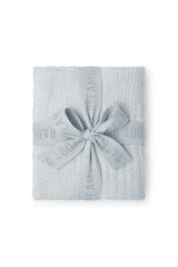 Barefoot Dreams CozyChic Lite blanket in blue showing velvety softness for naptime