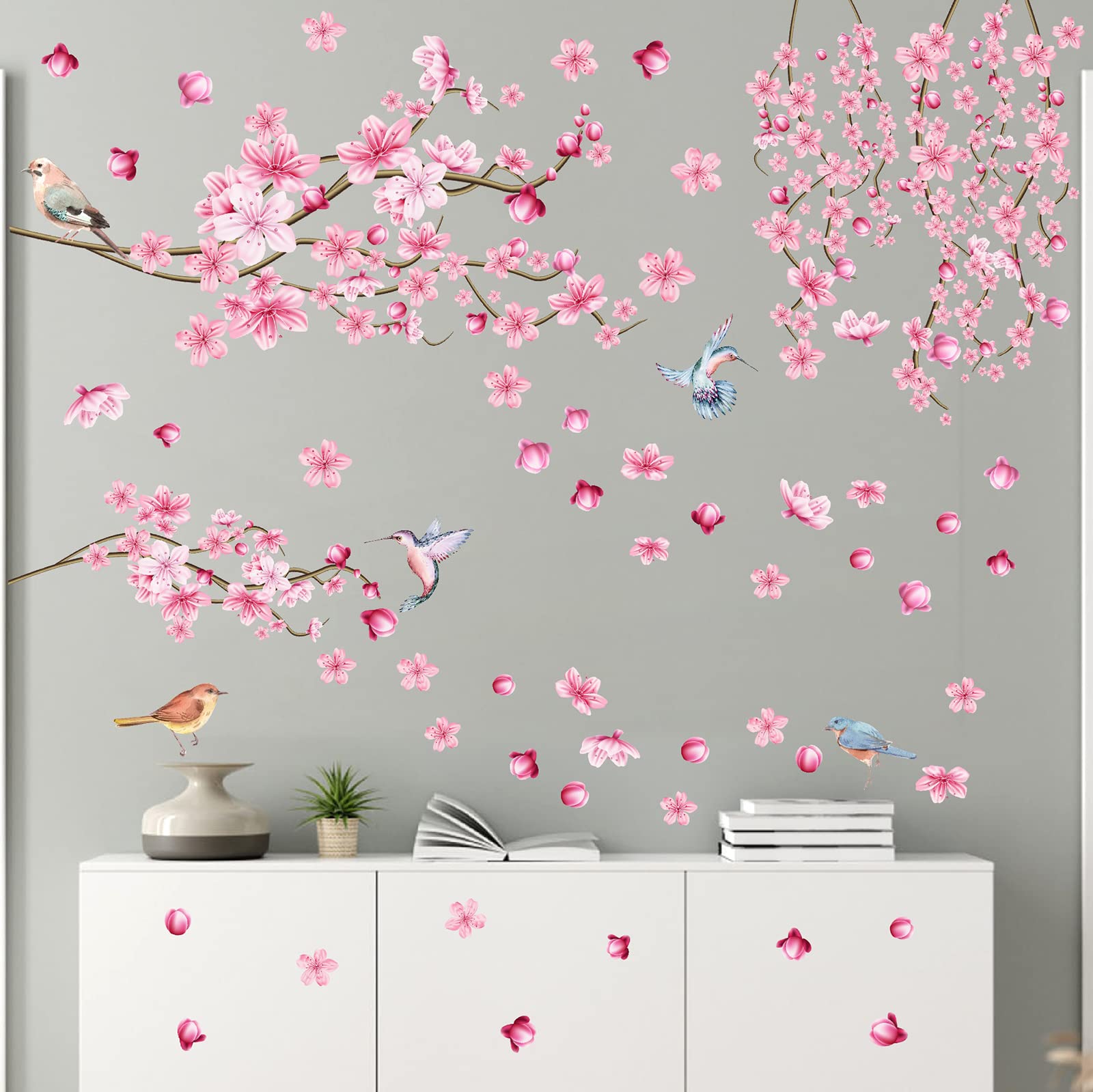 Barri Design Cherry Blossom wall decal with pink tree branch enhances nursery decor.