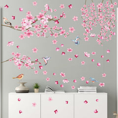 Barri Design Cherry Blossom wall decal with pink tree branch enhances nursery decor.