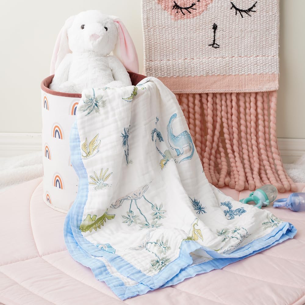 Battilo Pty dinosaur blanket used as a nursery photography prop for timeless shots.