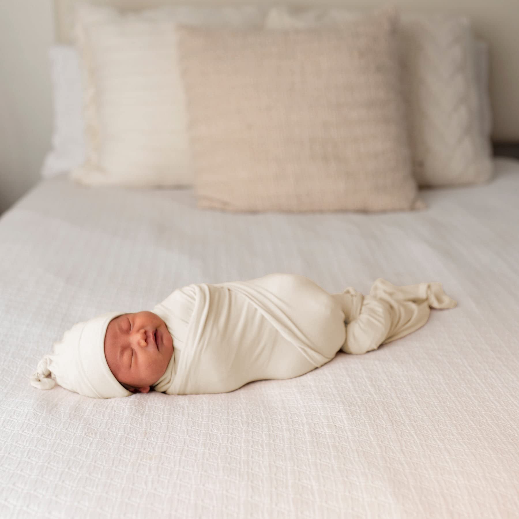 Bayceen swaddle with hat natural set demonstrates complete newborn swaddle and headwear for cozy mornings.
