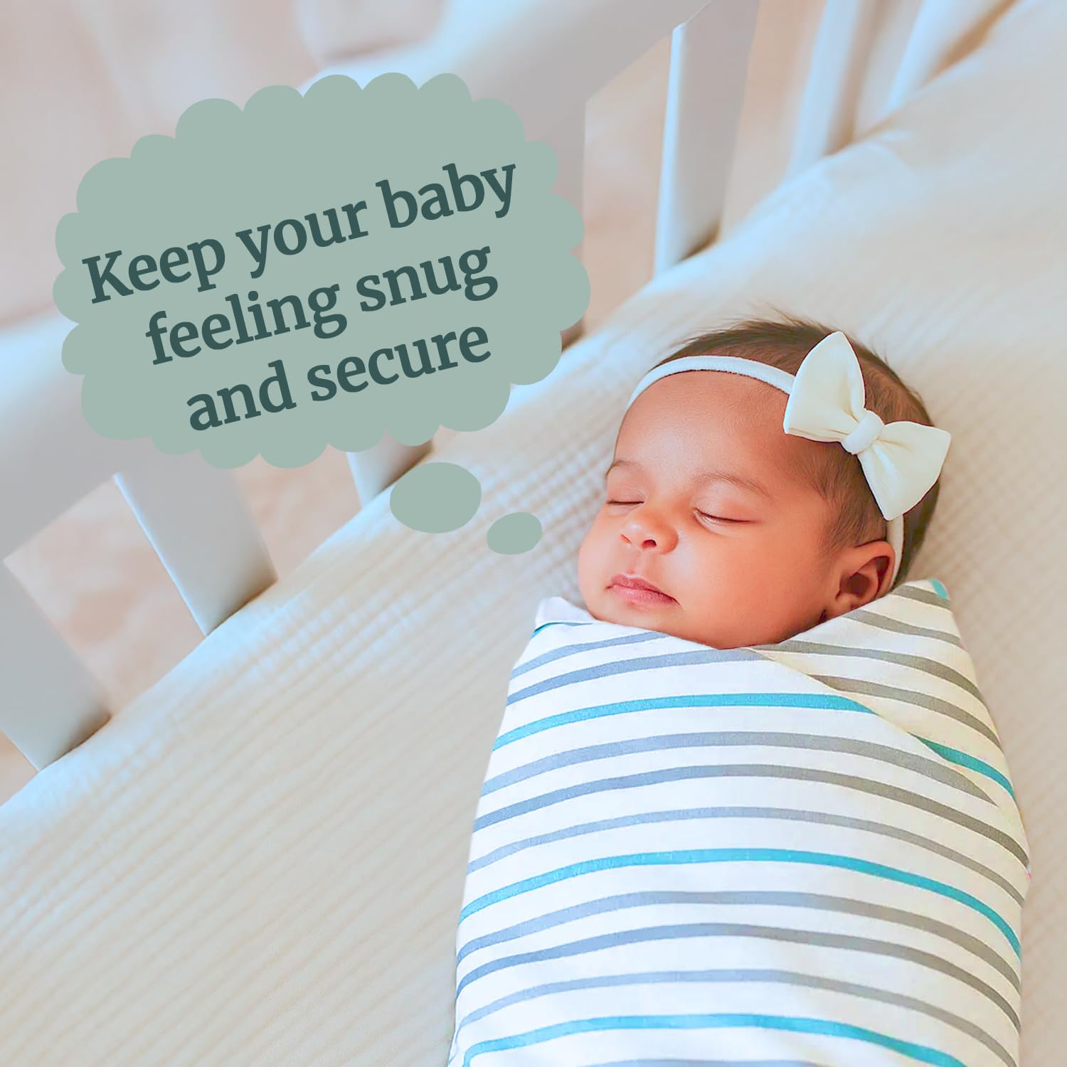 Bazzle Baby mint stripe swaddle in nursery setting.