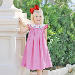 BBGifts two red bows on a baby’s hair demonstrate versatile style