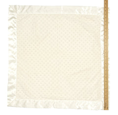 Bearington Baby Creamy White Dottie Snuggle Blanket close-up of satin edging for gentle touch.