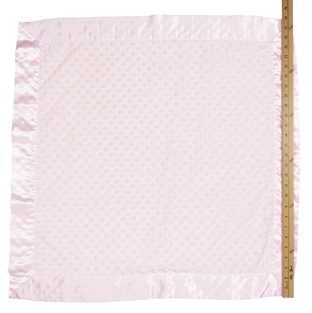 Bearington Collection pink satin trim blanket on crib showcases cozy styling for nurseries.
