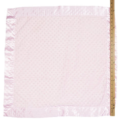 Bearington Collection pink satin trim blanket on crib showcases cozy styling for nurseries.