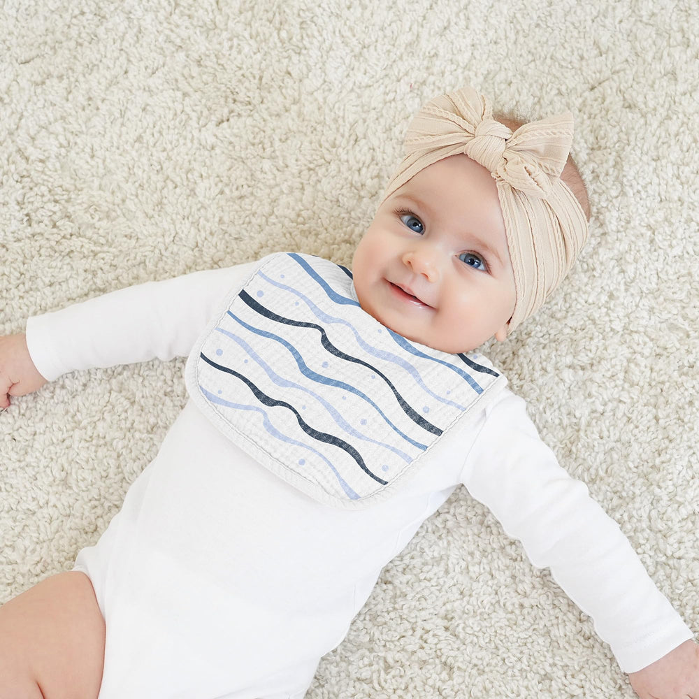 Bearmoss bib doubles as burp cloth for versatile use.