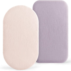 Bearmoss bassinet sheets in light pink and purple, top view, soft comfort for baby's delicate skin.