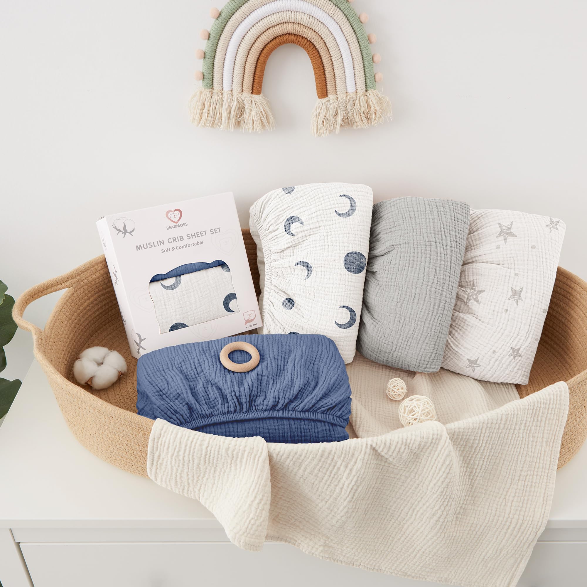 Bearmoss blue crescent sheets on crib with toddler-bed compatibility note.