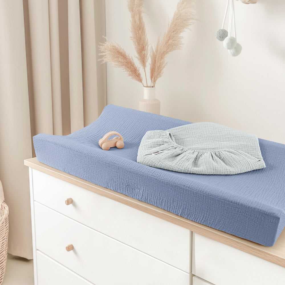 Bearmoss changing pad cover is machine washable for easy nursery care.
