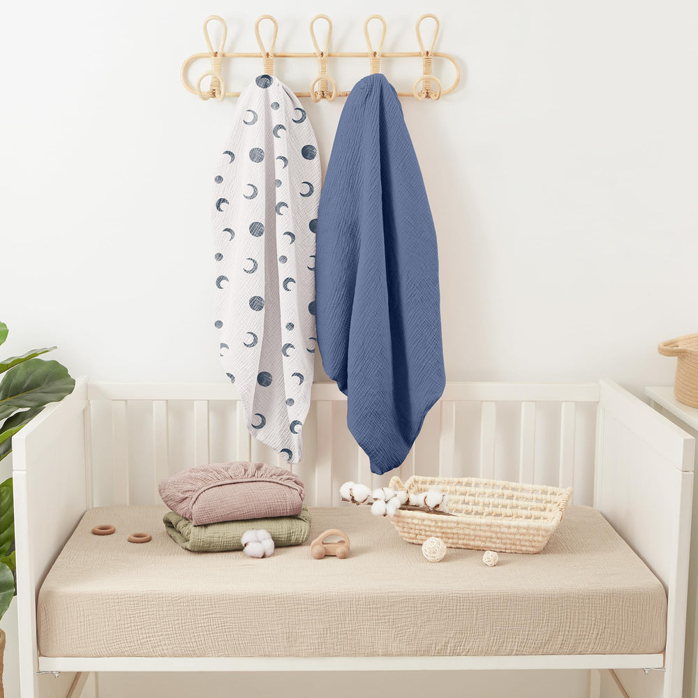 Care-ready Bearmoss crib sheet being machine washed on gentle cycle.