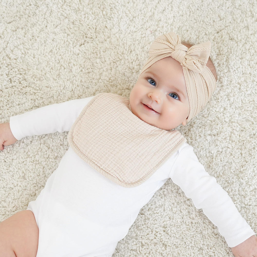 Bearmoss machine washable bibs for easy cleanup after meals.
