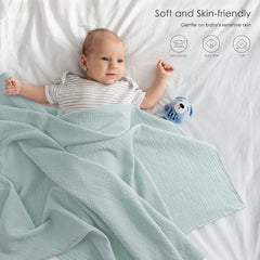 Bearmoss muslin swaddle close-up shows silky cotton fibers for gentle skin touch.