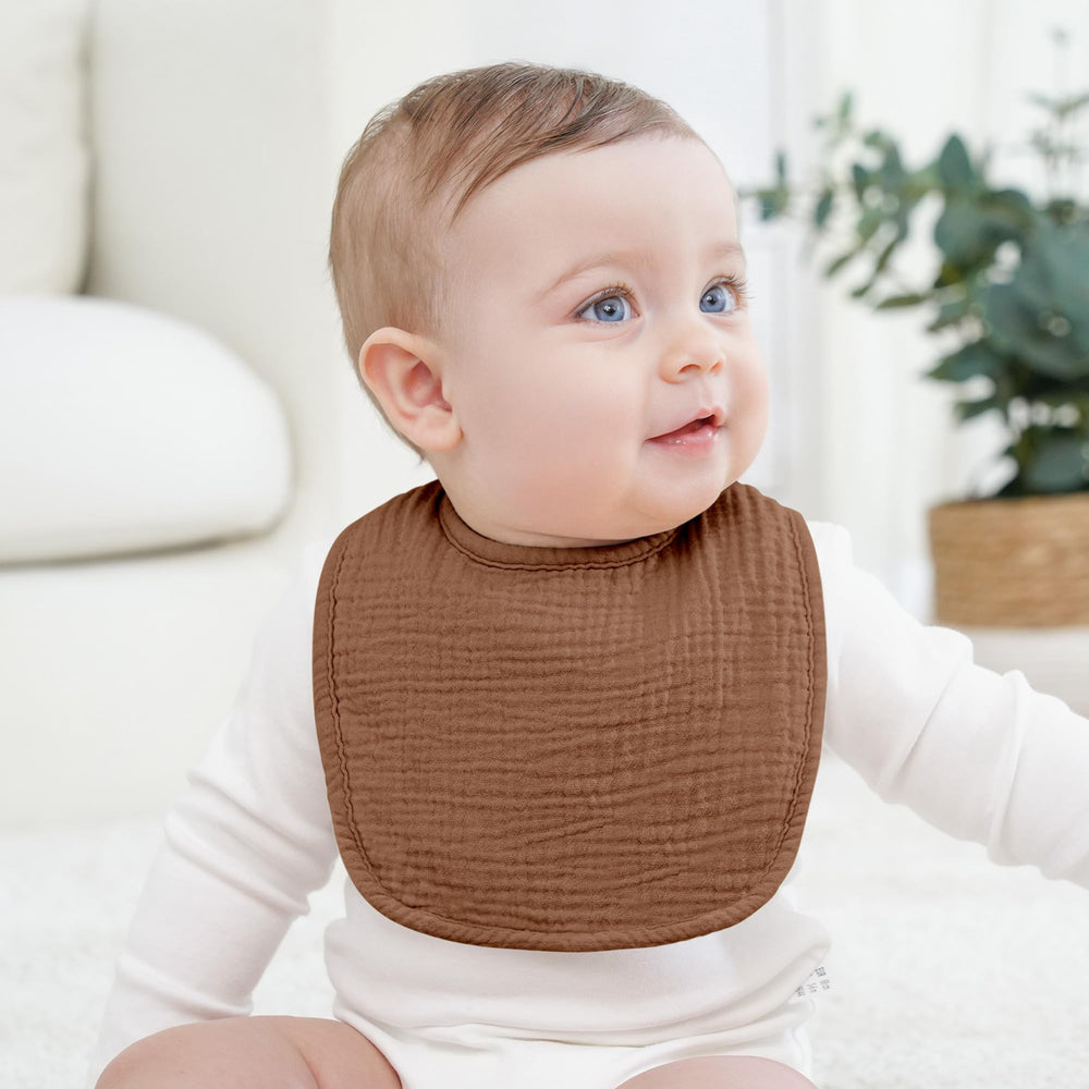 Bearmoss square bib used as burp cloth for quick cleanups.