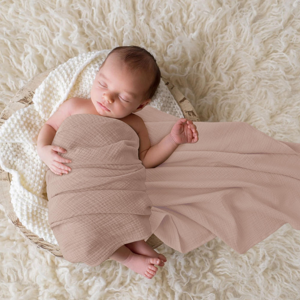 Bearmoss swaddle demonstrates secure wrap for peaceful newborn sleep.