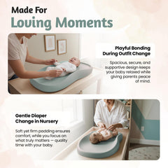 Teal changing pad surface, easy-clean and quick maintenance for diaper changes.