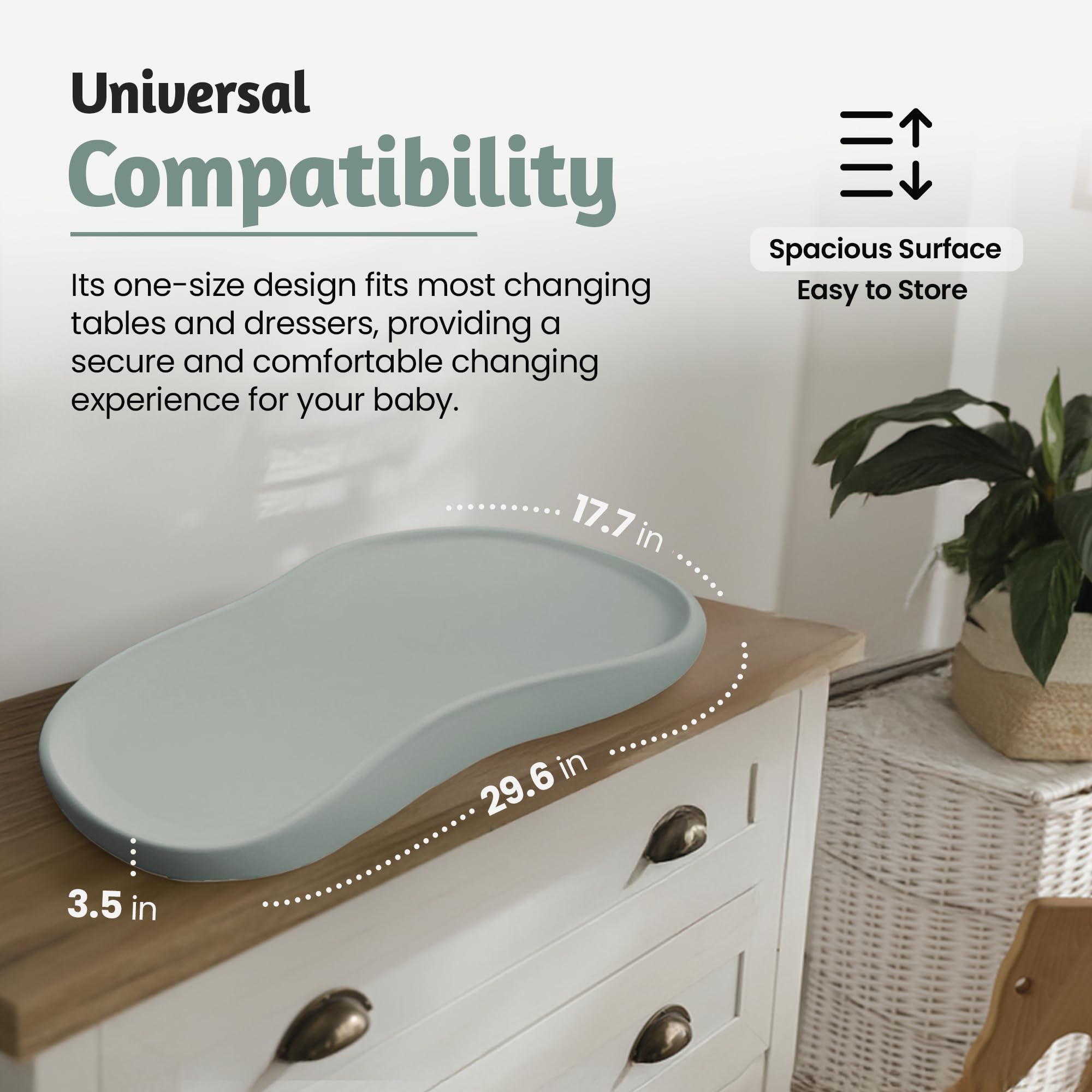 Universal fit changing pad in teal, compatible with most tables and dressers.
