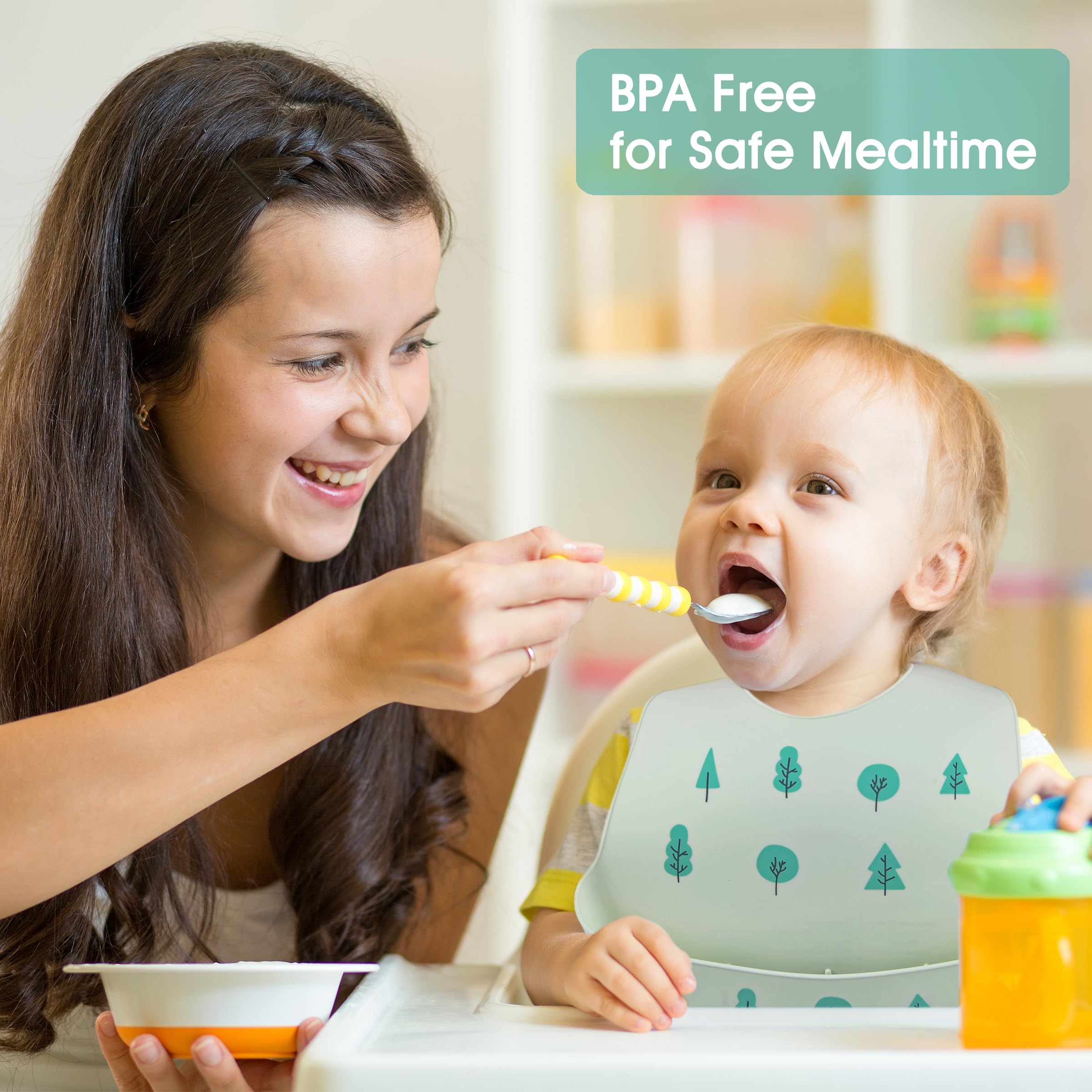 Green Trees design bib adding a playful touch to mealtime.