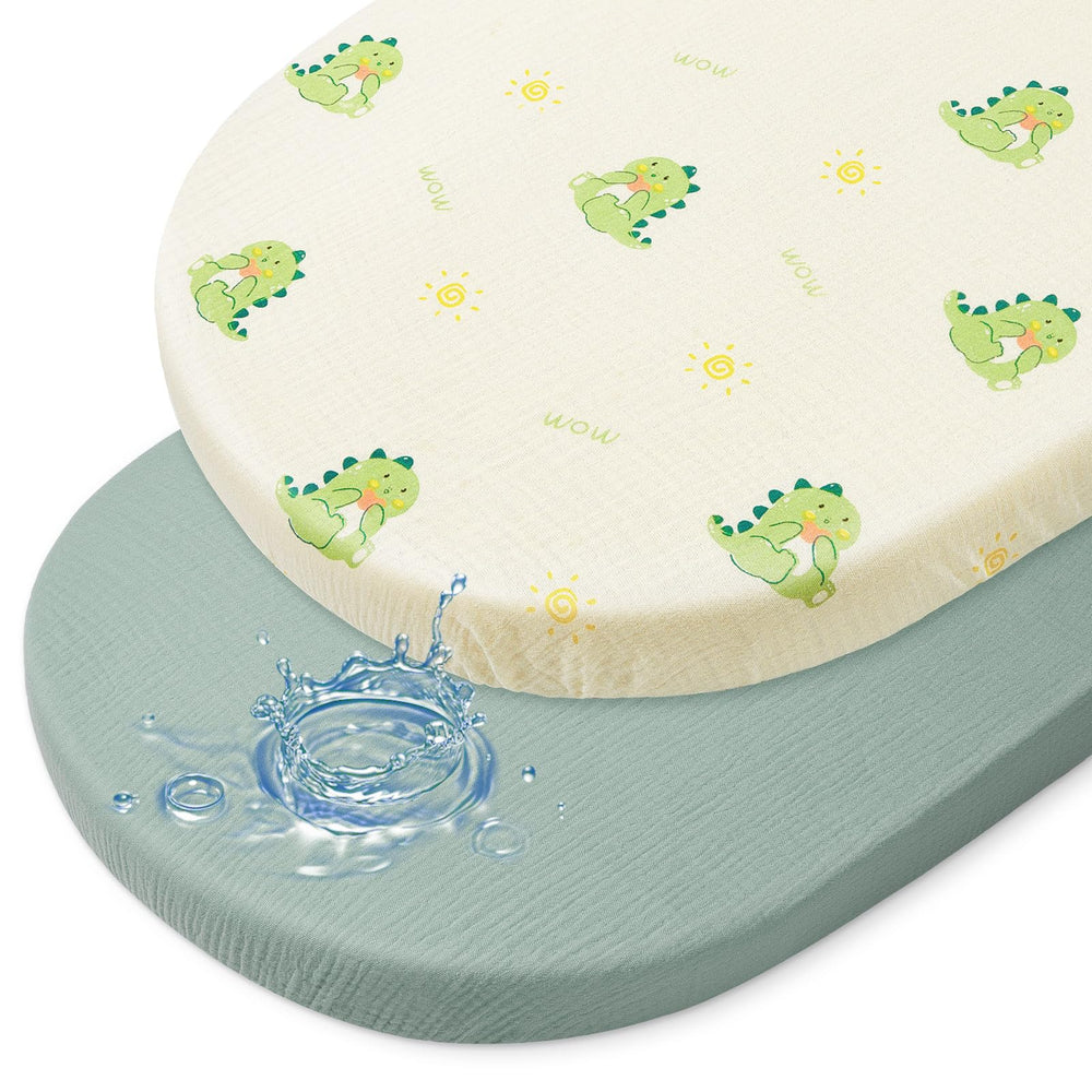 BeBeJoJo bassinet sheets with muslin top in green dinosaur pattern for gentle newborn comfort.