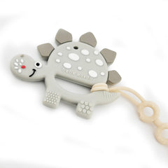 Bebe Mondo dinosaur teether with pacifier clip for secure on-the-go soothing.
