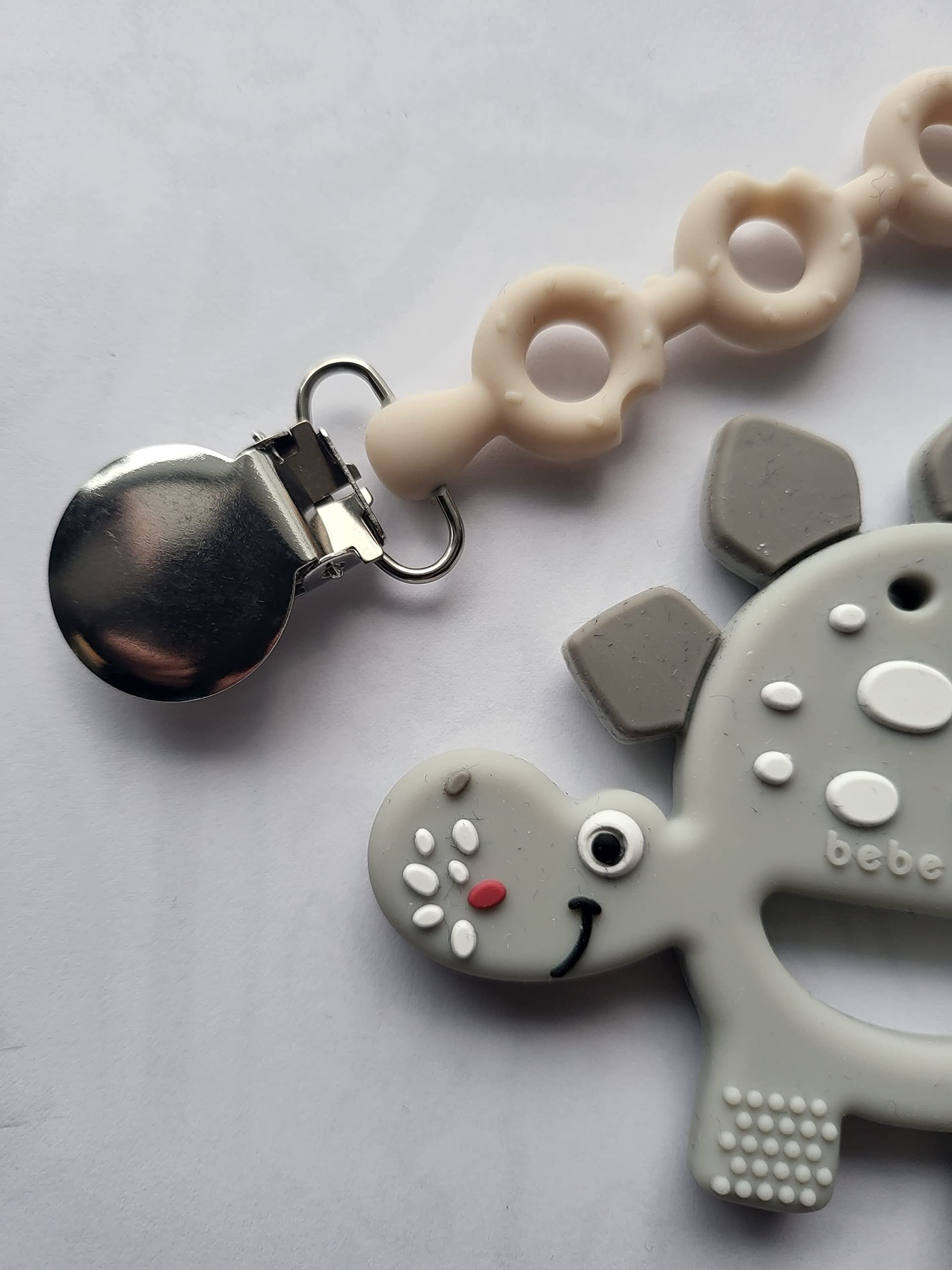 Bebe Mondo teether BPA-free design supports safe teething playtime.