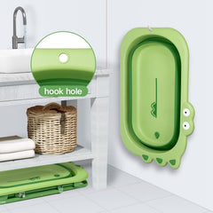 Beberoad Love adjustable-height bath tub in green on a stand for newborn bathing.