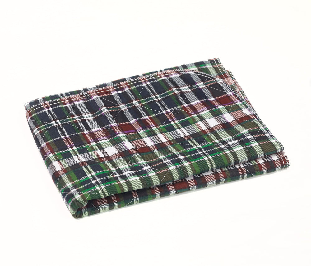 Beck's Classic 34x36 blue underpad in bedroom setting: bed protection
