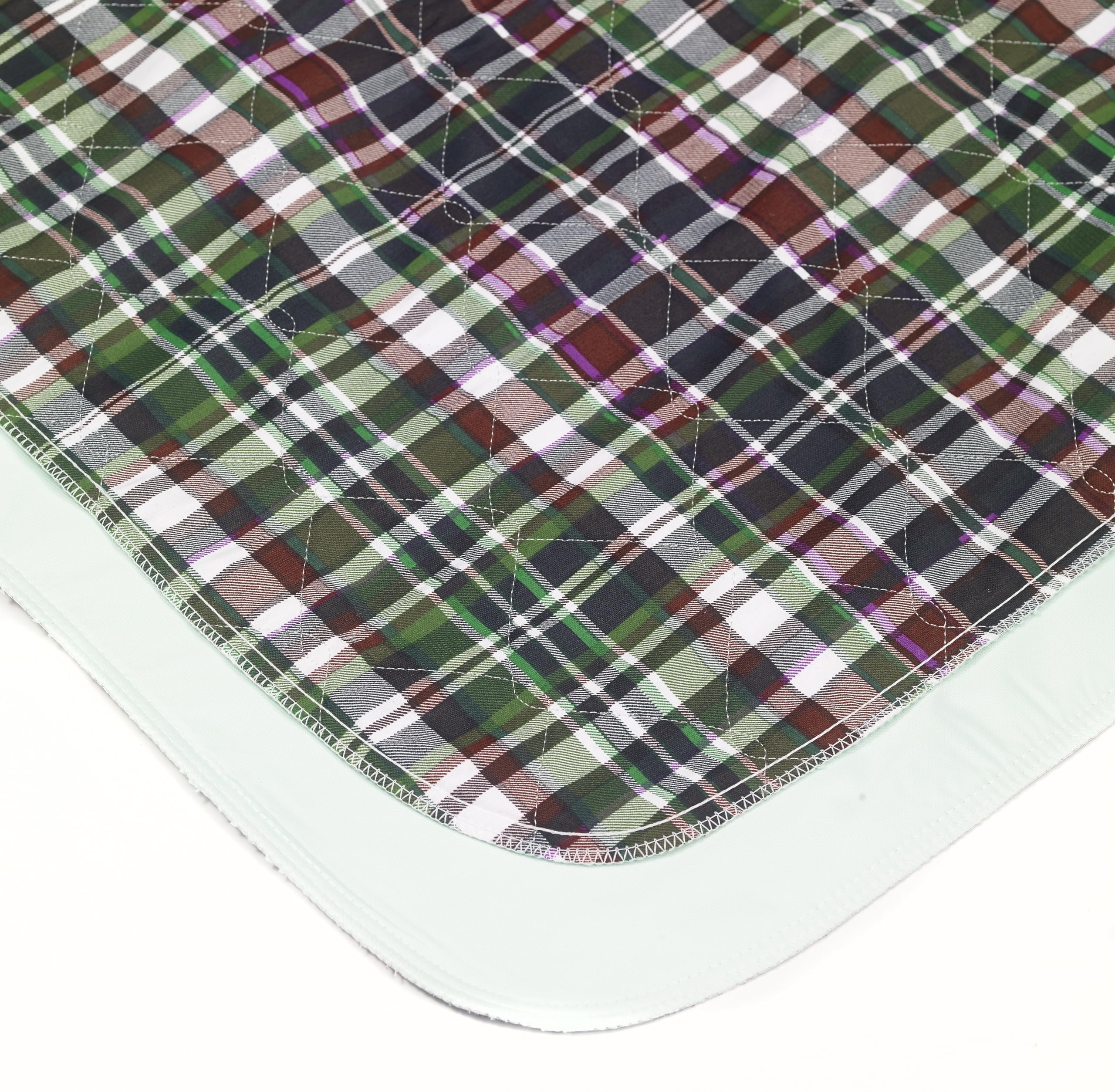 Beck's Classic underpad blue edge closeup: edge-to-edge liquid wicking