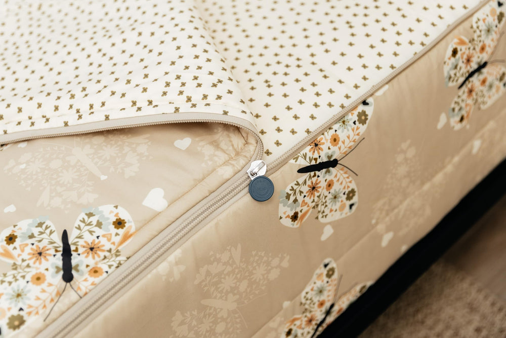 Beddy's butterfly bedding zipper closure keeps the comforter neatly in place