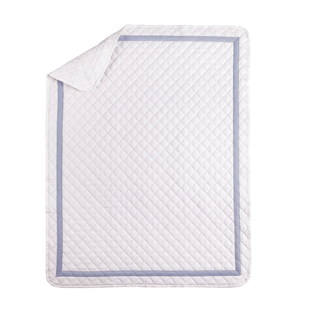 Bedward Stars bed skirt with dust ruffle adds a polished nursery finish.