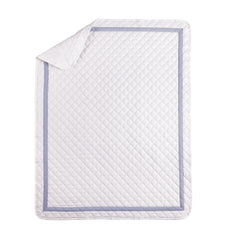 Bedward Stars bed skirt with dust ruffle adds a polished nursery finish.