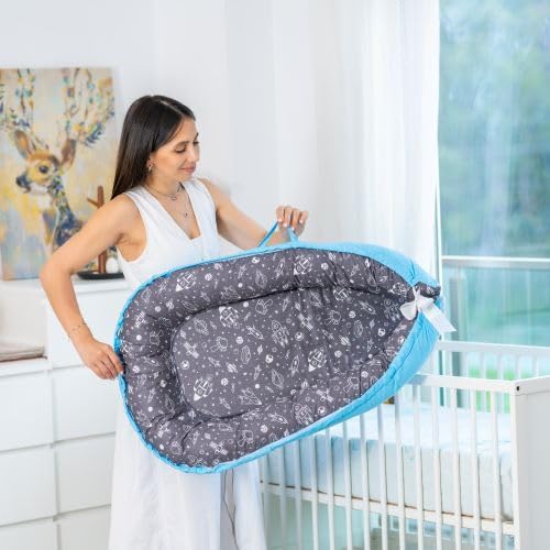 Beeezy Buddies Baby Lounger blue outer space nest-like design creates secure space.