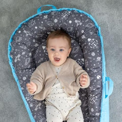 Beeezy Buddies Baby Lounger blue outer space side view portable travel companion.