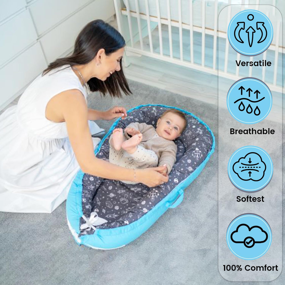 Beeezy Buddies Baby Lounger blue outer space water-resistant material helps with spills.