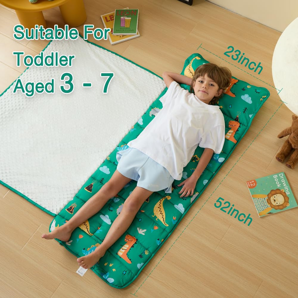 Beeweed dinosaur nap mat closeup reveals plush texture and raised dots.